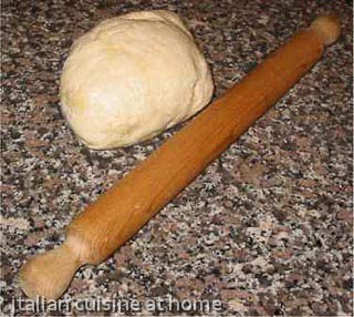 dough for piadina and rolling pin