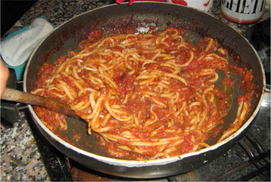 saute spaghetti in the sauce fo meatballs